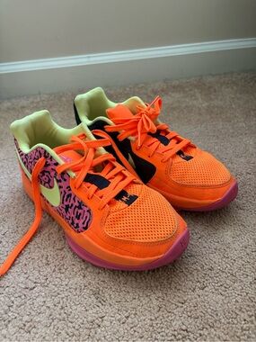 Orange Nike shoes